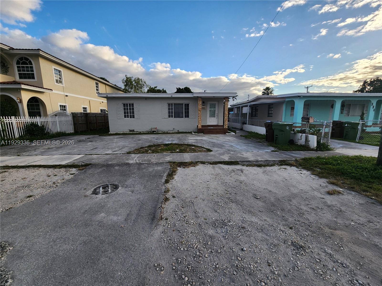 342 East 46th Street, Unit 1 Hialeah, FL 33013 - Photo 23 of 26 a view of a yard with car parked