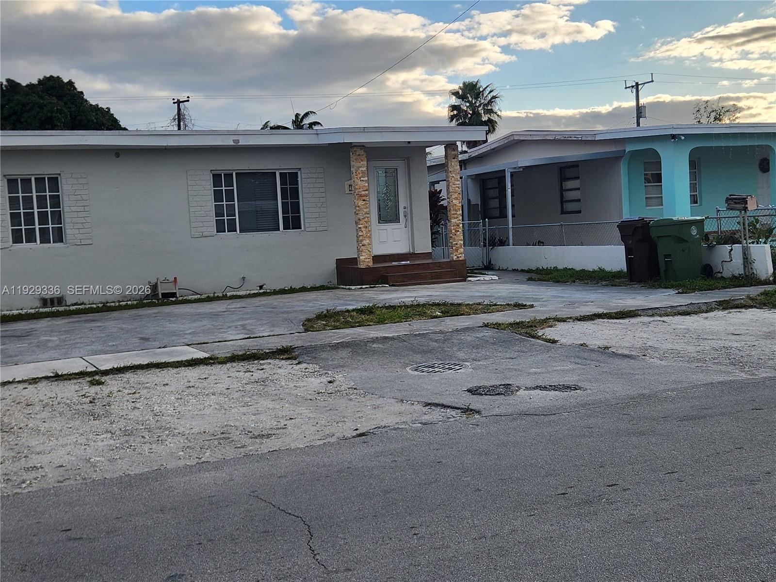 342 East 46th Street, Unit 1 Hialeah, FL 33013 - Photo 26 of 26 a view of a house with a backyard