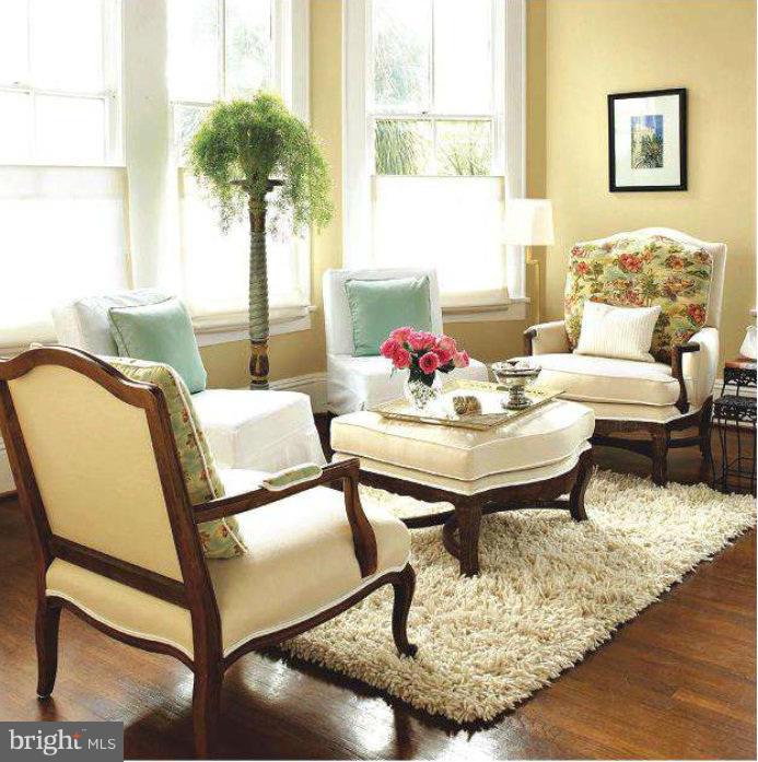708 Tolbert Drive Odenton, MD 21113 - Photo 2 of 21 a living room with furniture and a potted plant