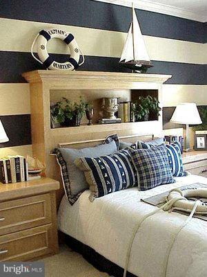 708 Tolbert Drive Odenton, MD 21113 - Photo 15 of 21 a bedroom with a bed and lamp