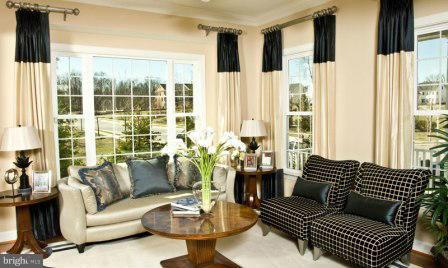 708 Tolbert Drive Odenton, MD 21113 - Photo 7 of 21 a living room with furniture and a large window