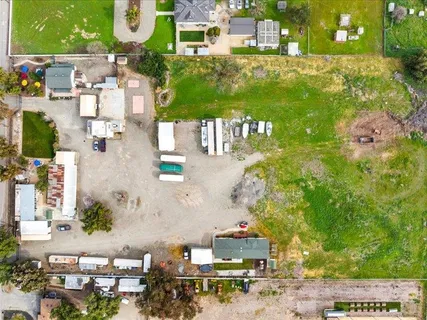 a kitchen with a stove top oven sink and cabinets