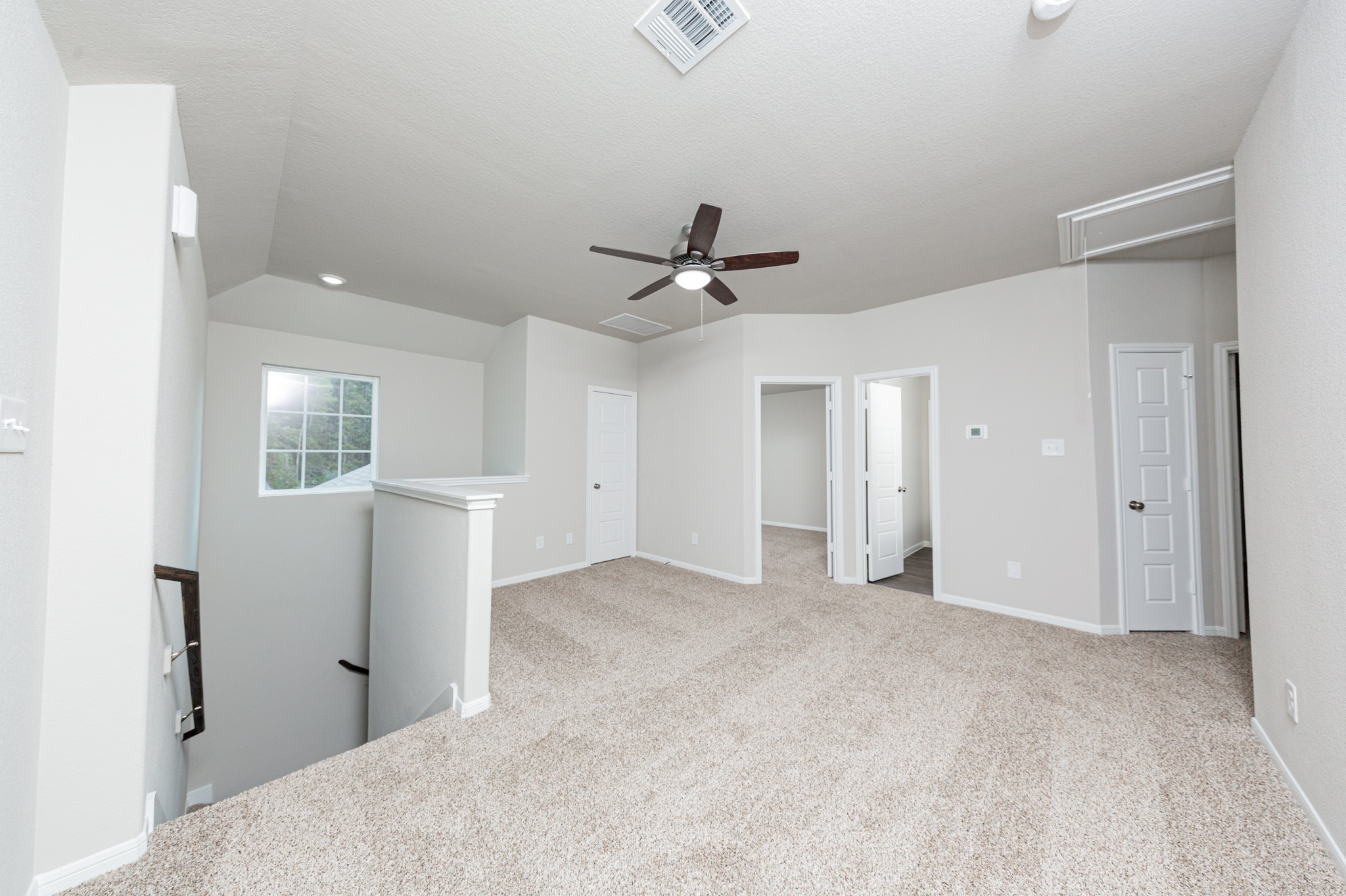 3042 Nickell Back Drive Conroe, TX 77301 - Photo 13 of 24 a view of a livingroom with a ceiling fan and window
