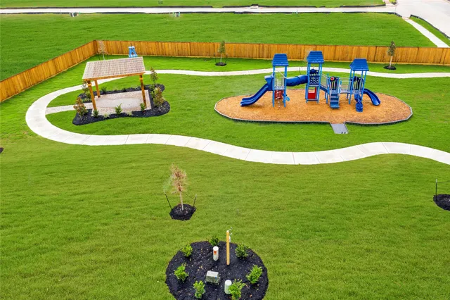a view of a play ground with an outdoor space