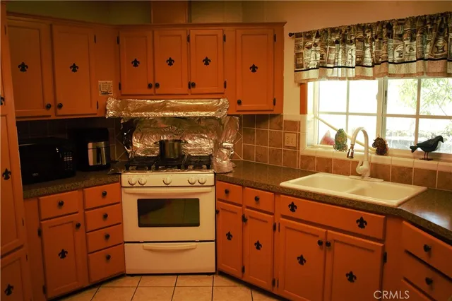 a white refrigerator freezer sitting in a kitchen