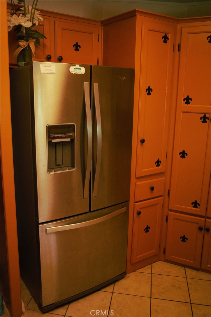 58870 Granite Gulley Road Anza, CA 92539 - Photo 13 of 29 a white refrigerator freezer sitting in a kitchen