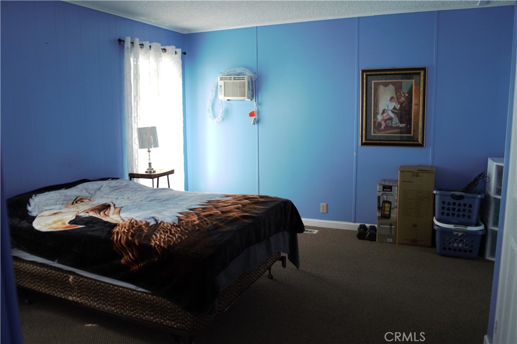 58870 Granite Gulley Road Anza, CA 92539 - Photo 20 of 29 a bedroom with a bed and a window