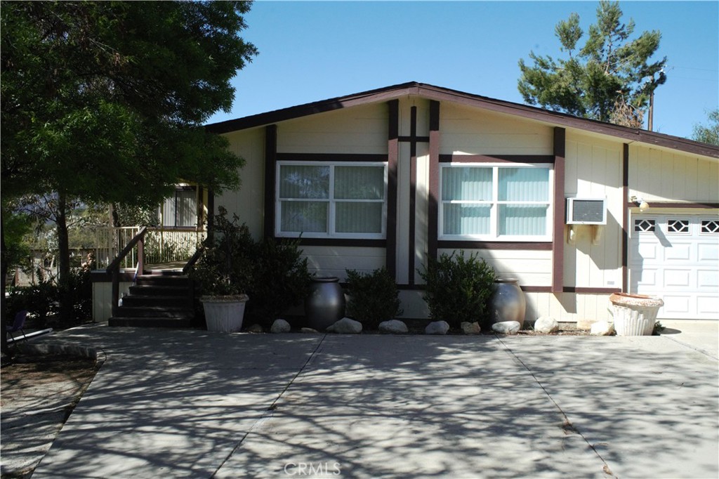 58870 Granite Gulley Road Anza, CA 92539 - Photo 2 of 29 a front view of a house