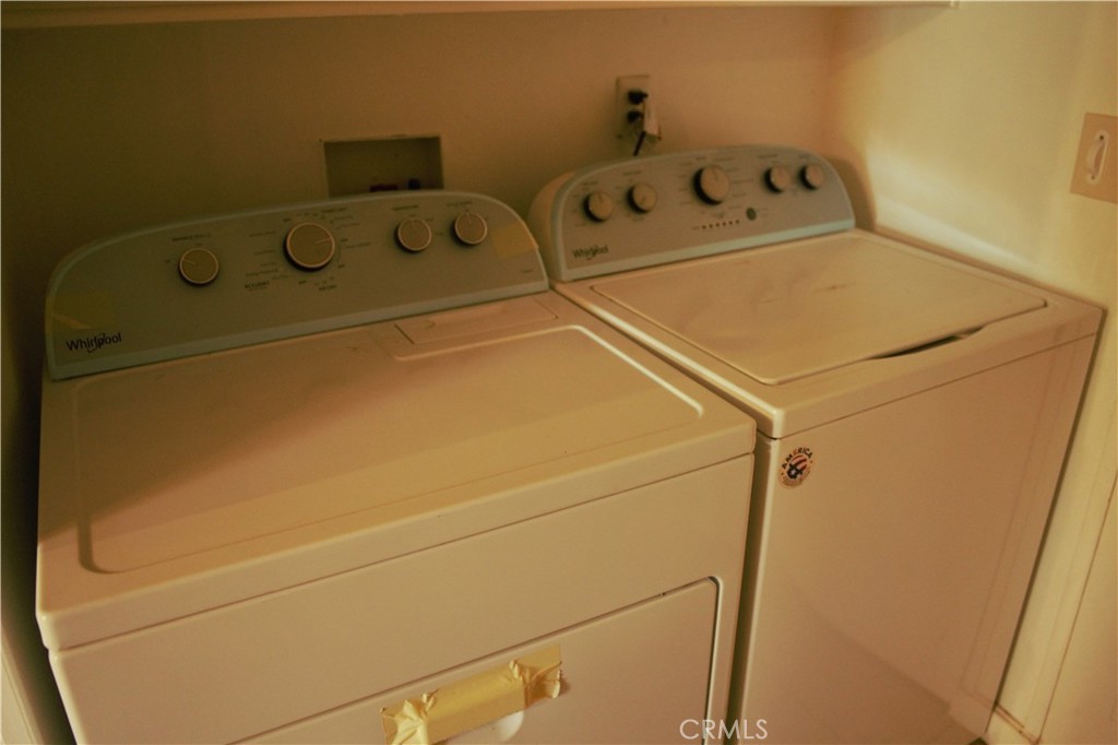58870 Granite Gulley Road Anza, CA 92539 - Photo 27 of 29 a utility room with dryer and washer