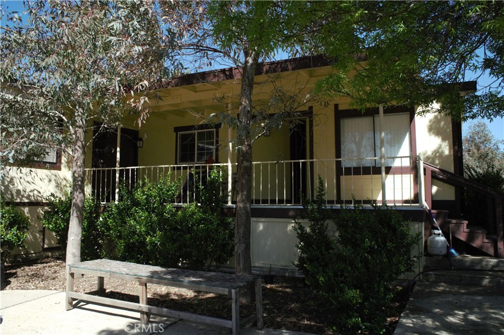 58870 Granite Gulley Road Anza, CA 92539 - Photo 6 of 29 a view of a house with a yard