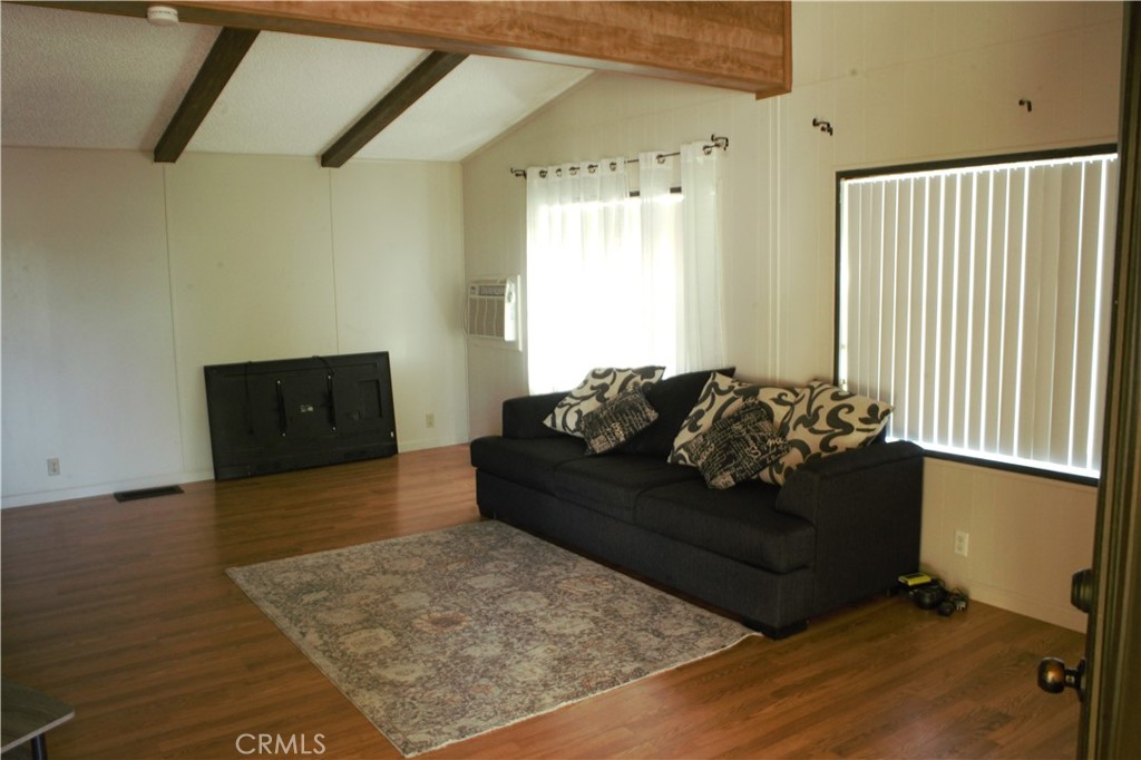 58870 Granite Gulley Road Anza, CA 92539 - Photo 8 of 29 a living room with furniture and a flat screen tv