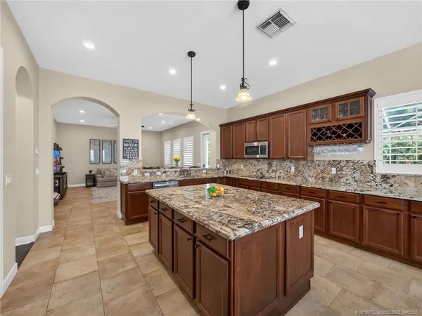 $995,000 | 5621 Southwest Longspur Lane, Palm City, FL 34990