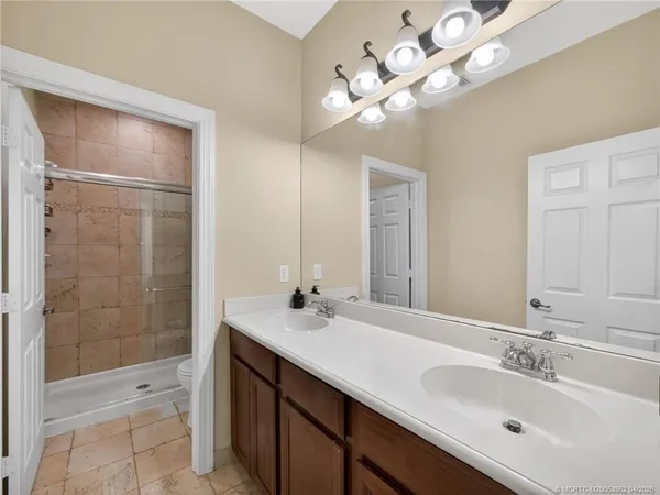 $995,000 | 5621 Southwest Longspur Lane, Palm City, FL 34990