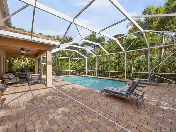 $995,000 | 5621 Southwest Longspur Lane, Palm City, FL 34990