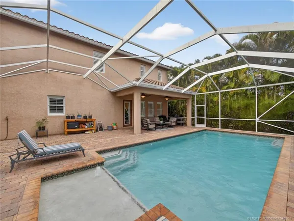 $995,000 | 5621 Southwest Longspur Lane, Palm City, FL 34990