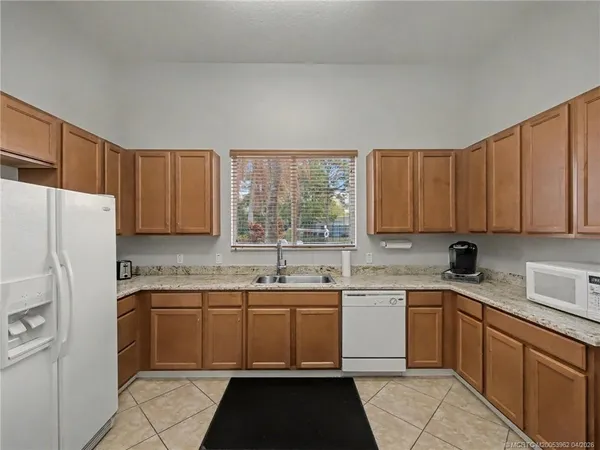 $995,000 | 5621 Southwest Longspur Lane, Palm City, FL 34990