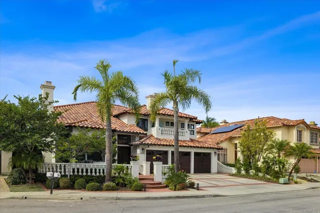front view of a house with a small yard