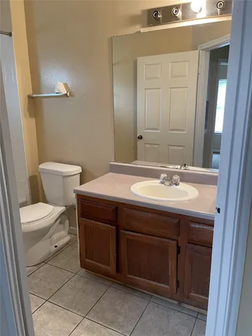 a bathroom with a sink and a toilet