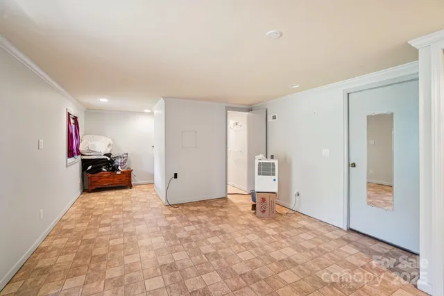 a view of a room with a large window