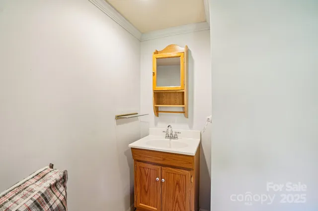 a view of a bathroom from a hallway