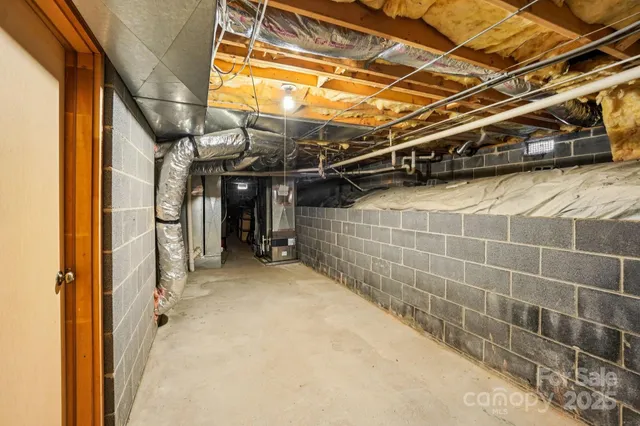 a view of a two chairs in the balcony
