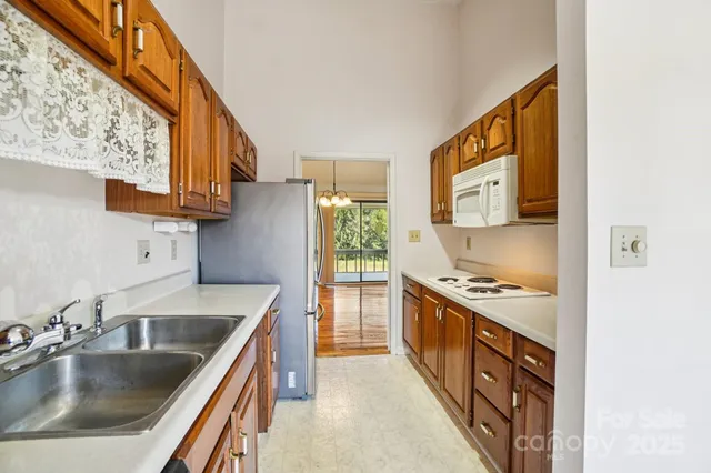 a kitchen with a stove and a sink