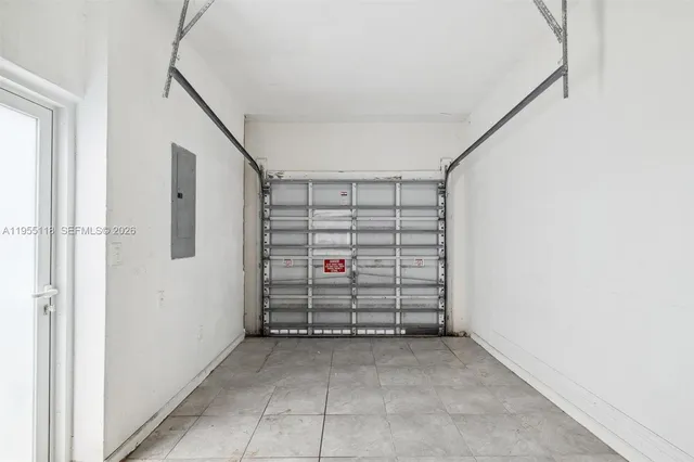 a view of backyard with swimming pool and outdoor seating