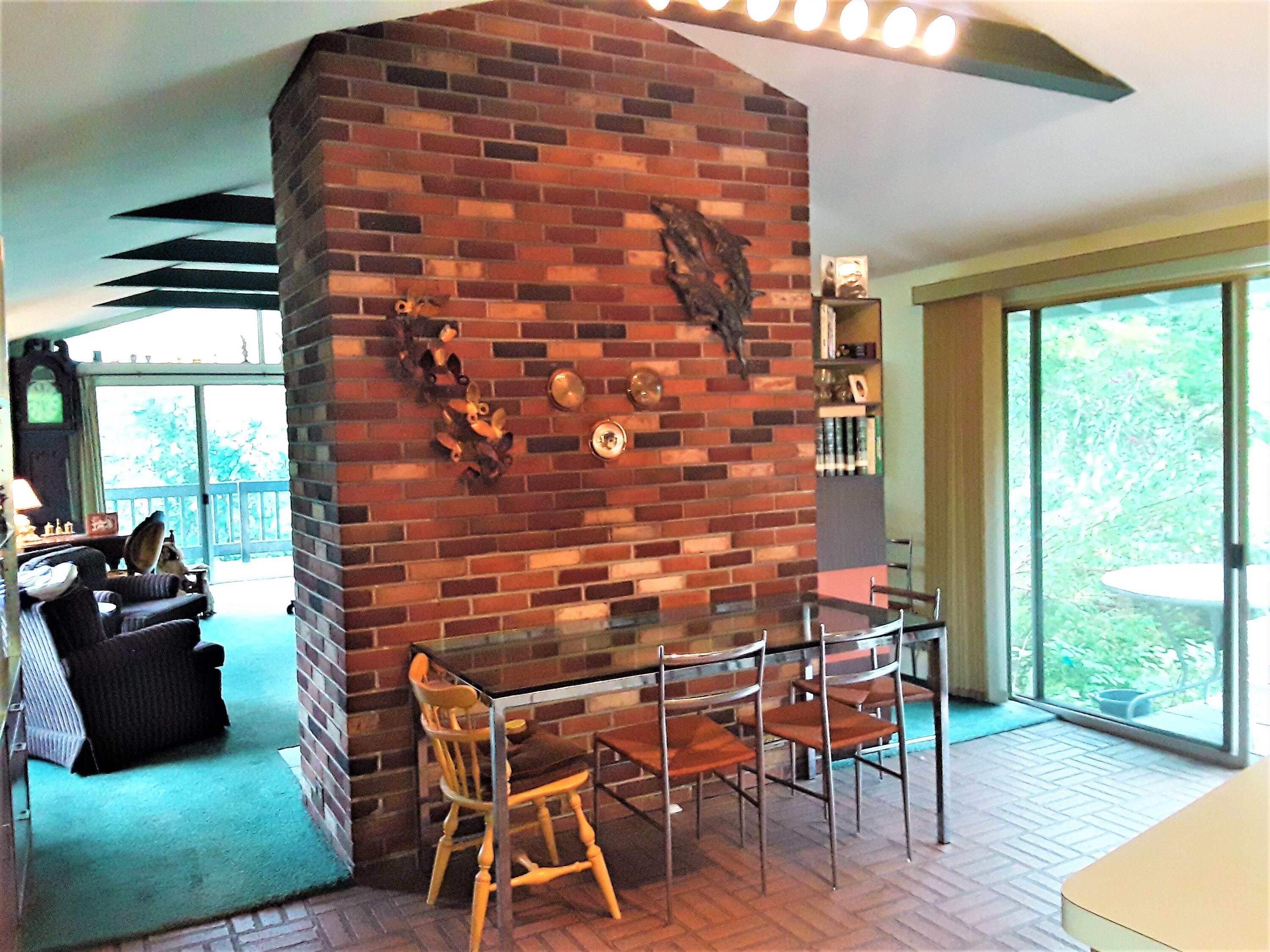60 Cedar Land Road Orleans, MA 02653 - Photo 11 of 30 a dining room with furniture and wooden floor