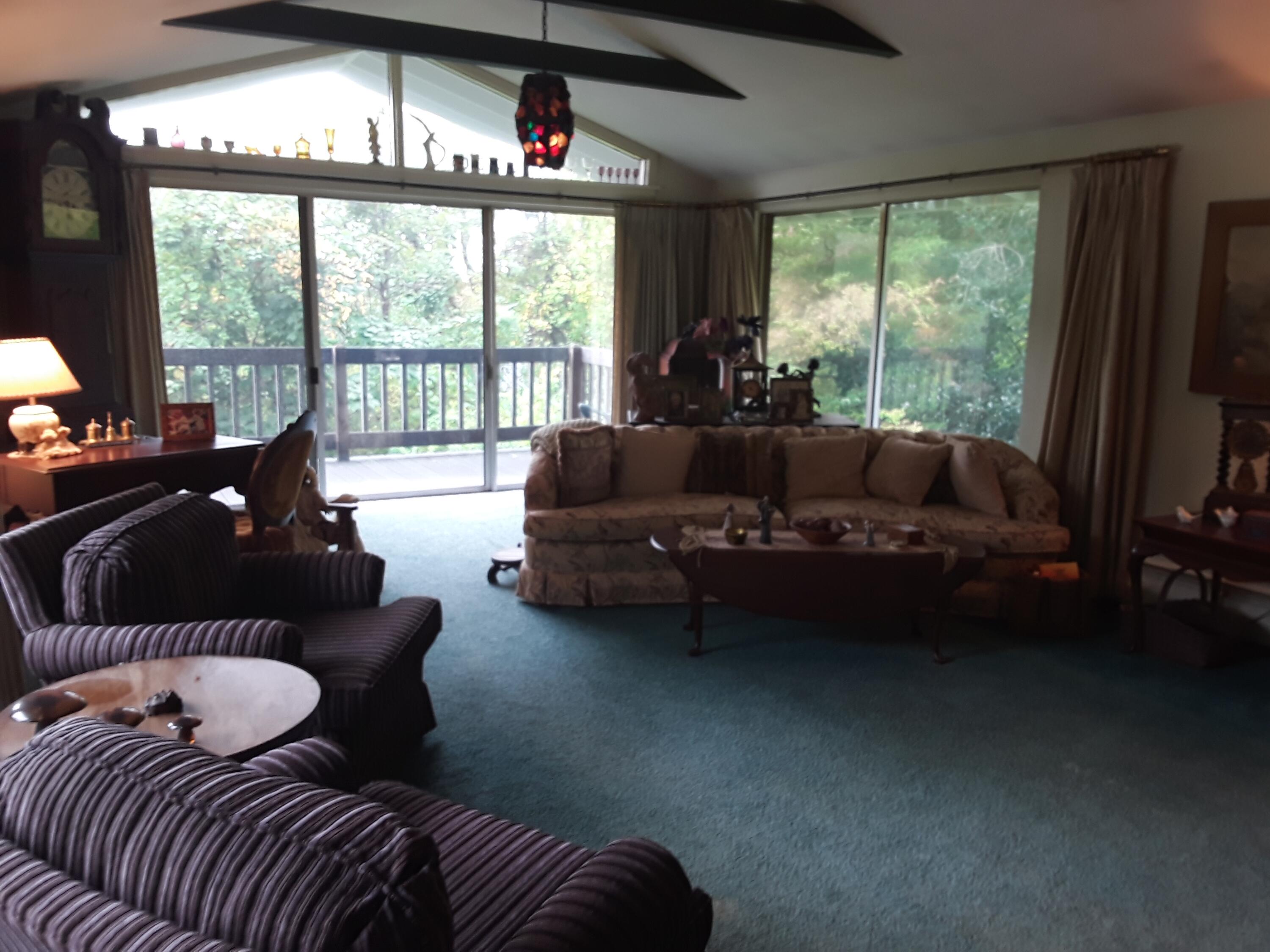 60 Cedar Land Road Orleans, MA 02653 - Photo 14 of 30 a living room with furniture and a large window