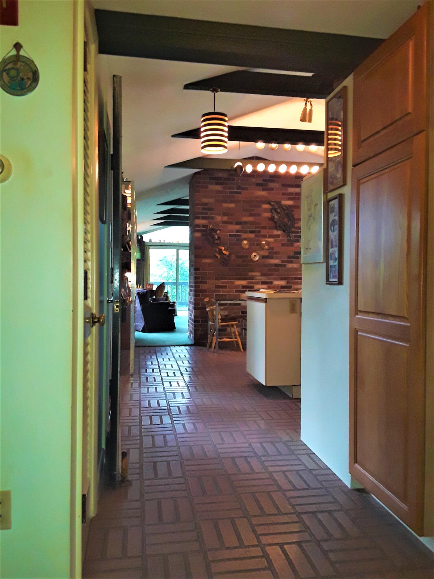 60 Cedar Land Road Orleans, MA 02653 - Photo 17 of 30 a view of a hallway with an empty room
