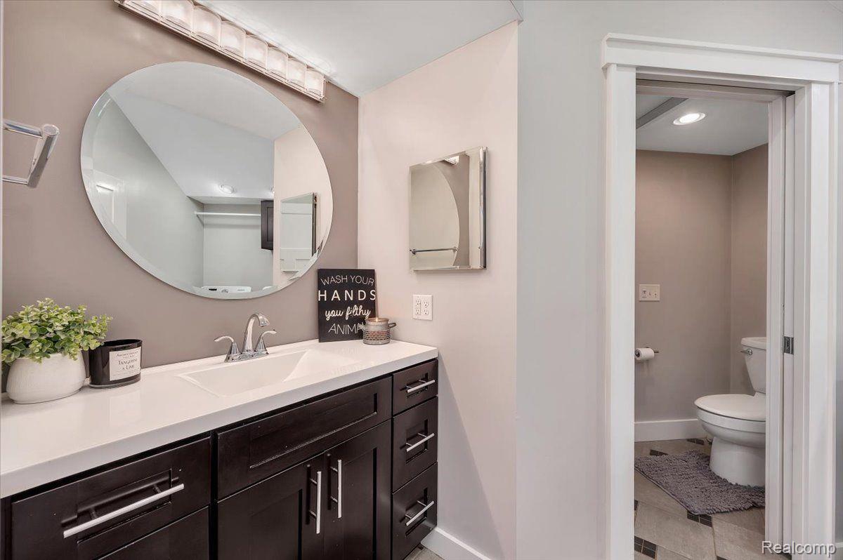 5393 Davison Road Lapeer, MI 48446 - Photo 18 of 22 Beautiful bathroom with walk-in shower