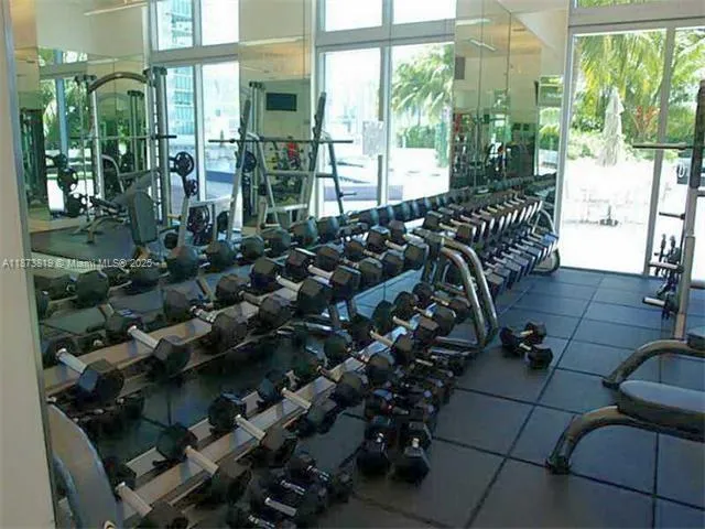 a view of a chairs and table in a patio