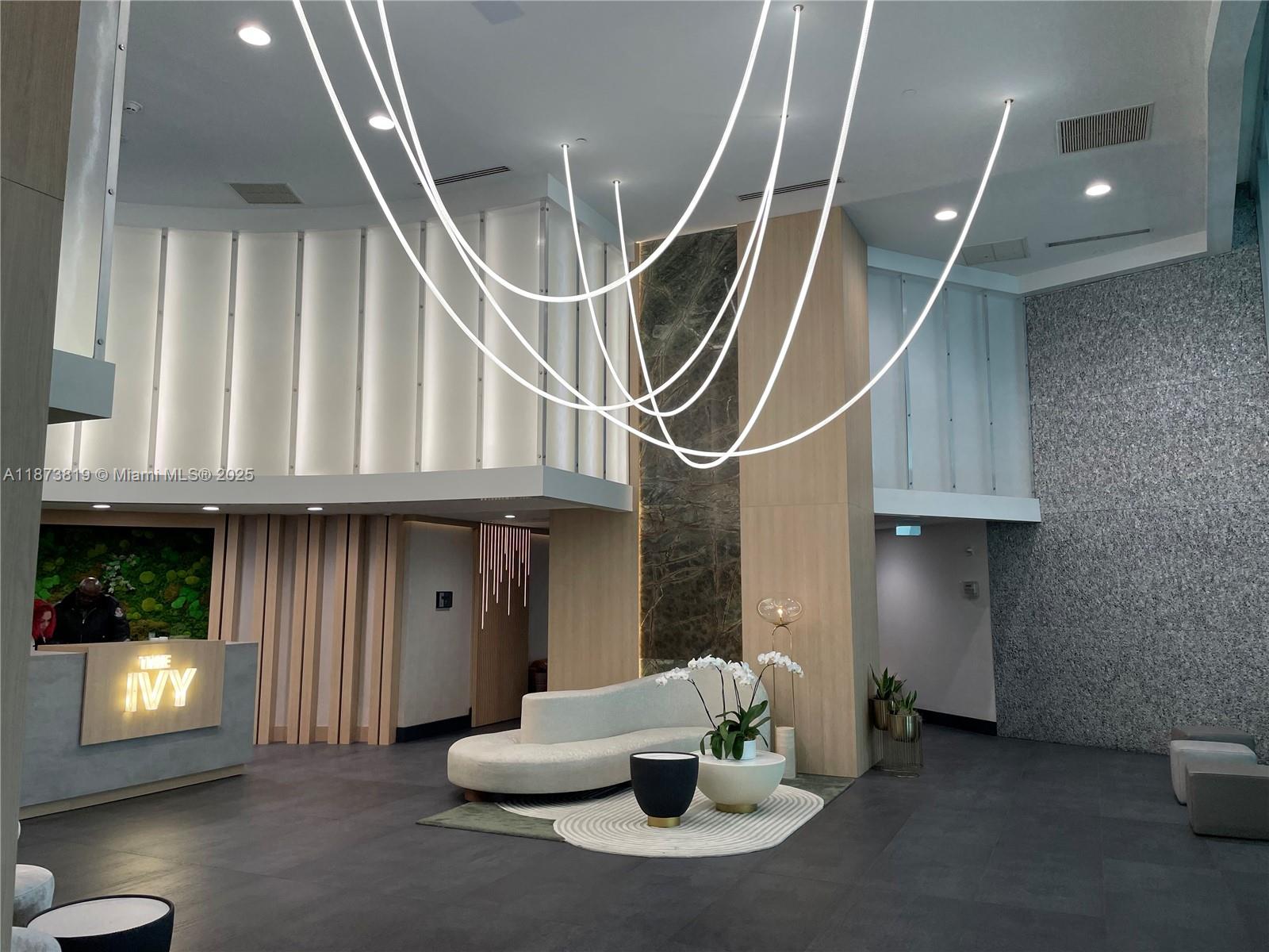 90 Southwest 3rd Street, Unit 1809 Miami, FL 33130 - Photo 29 of 35 a view of an entryway with staircase