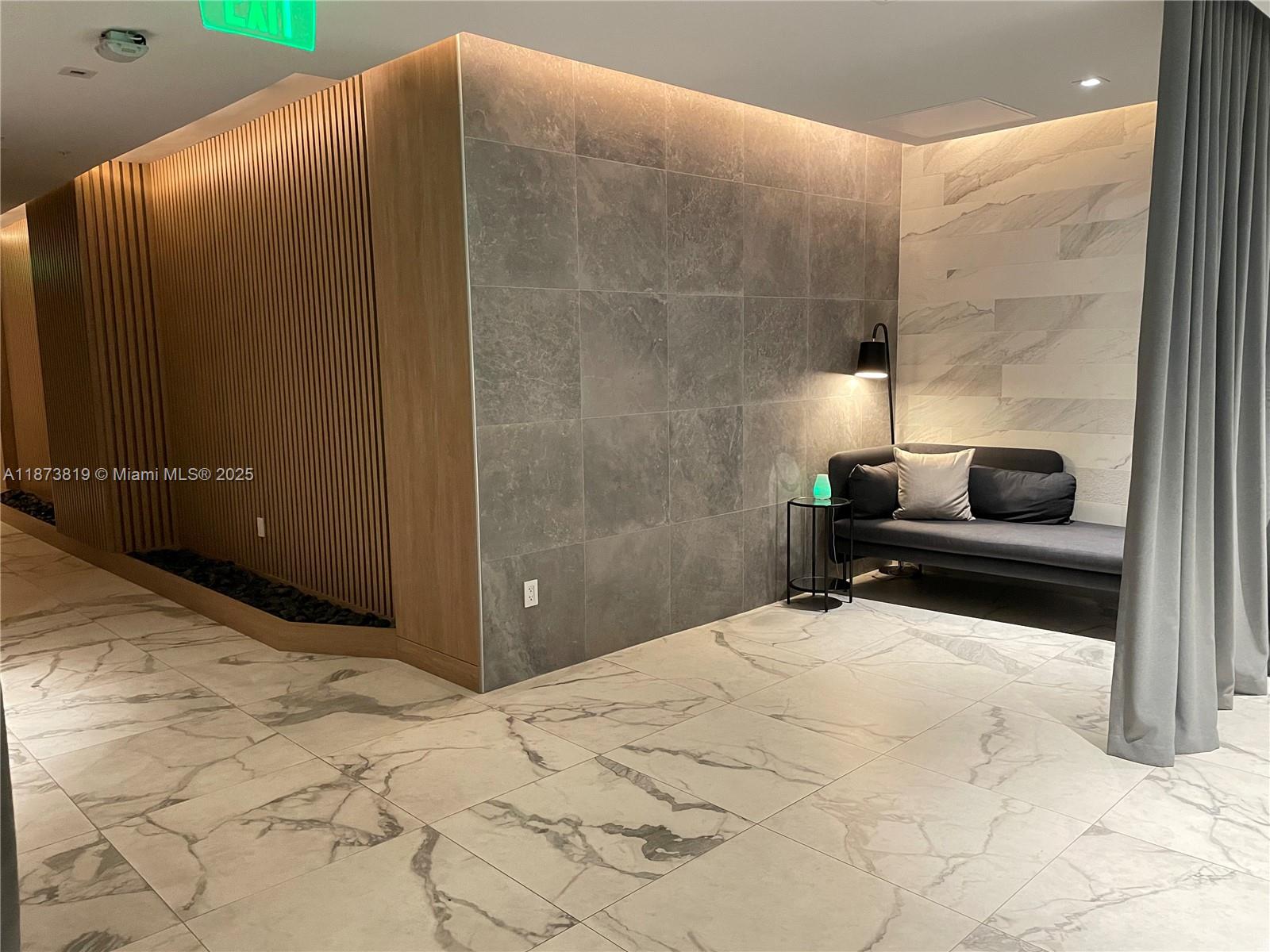 90 Southwest 3rd Street, Unit 1809 Miami, FL 33130 - Photo 34 of 35 a bedroom with a bed and a cabinets