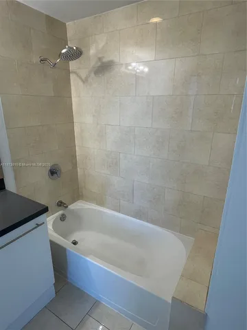 a close view of a bathtub in bathroom