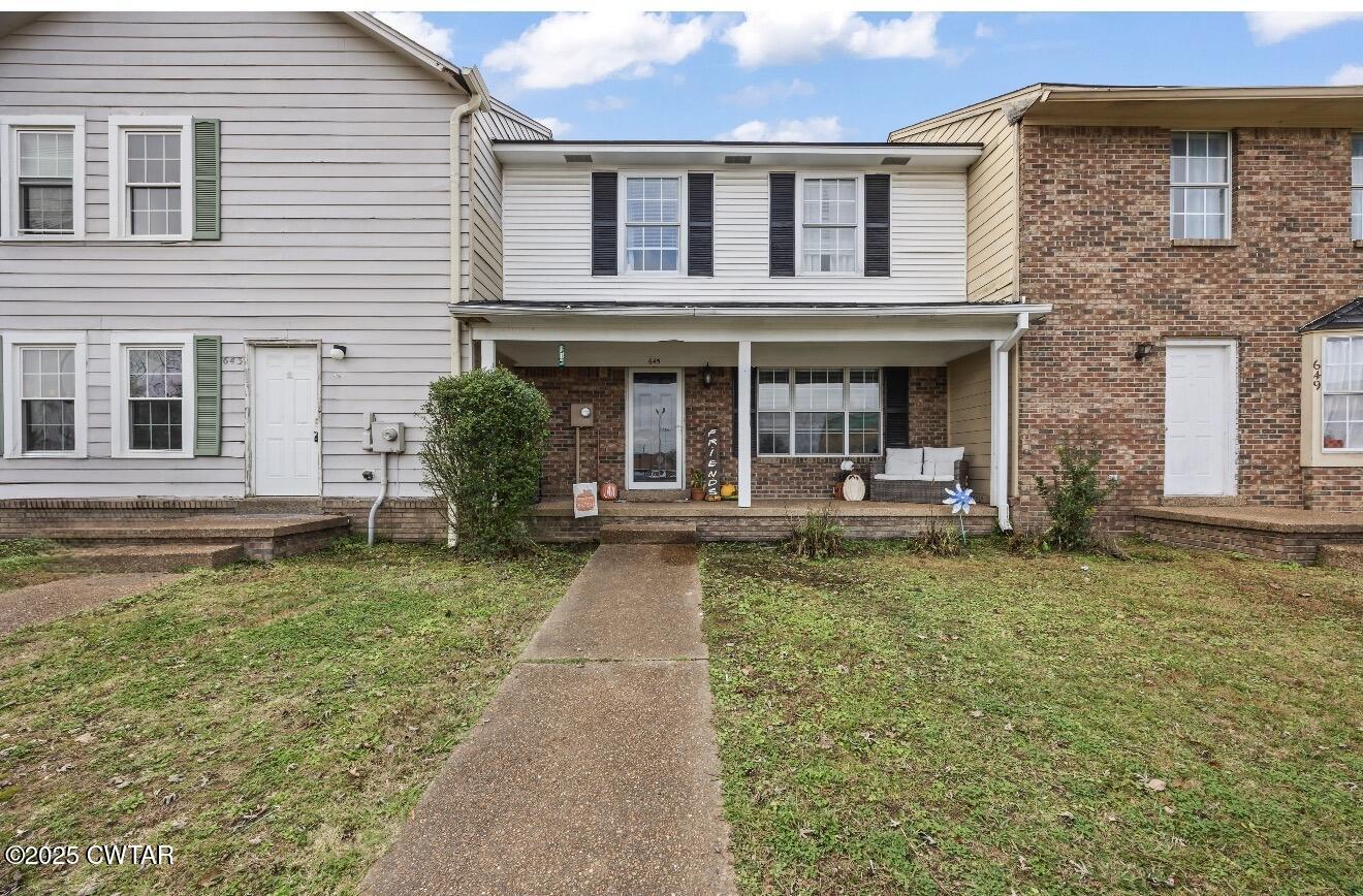 645 Walker Road Jackson, TN 38305 - Photo 1 of 16 a view of a house with a yard
