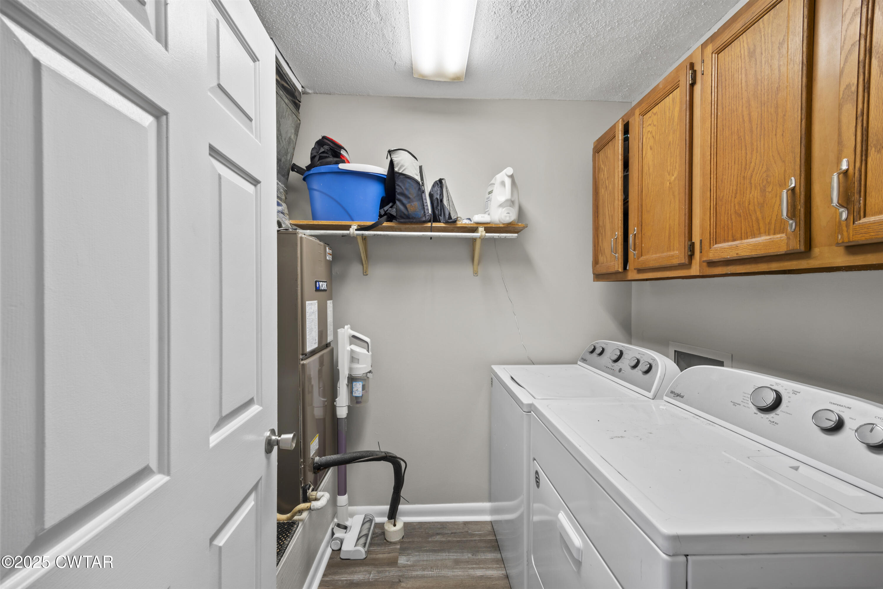 645 Walker Road Jackson, TN 38305 - Photo 15 of 16 a view of storage and utility room with washer and dryer