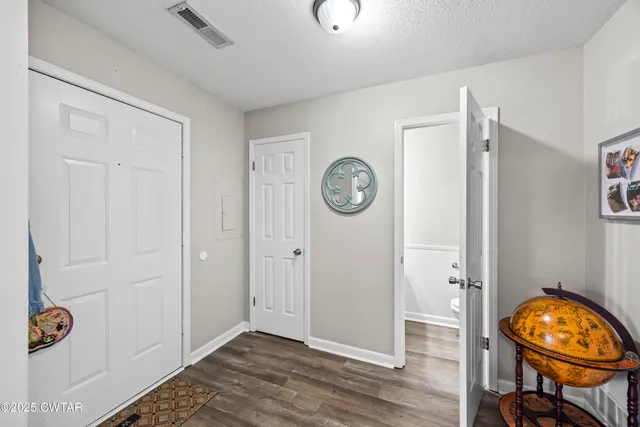 a view of a hallway with elevator