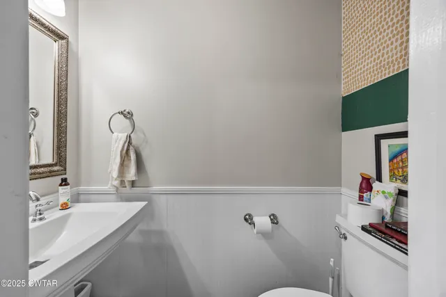 a bathroom with a sink and a toilet