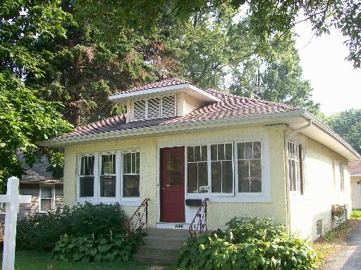 1825 183rd Street Homewood, IL 60430 - Photo 1 of 1 a front view of a house with a yard