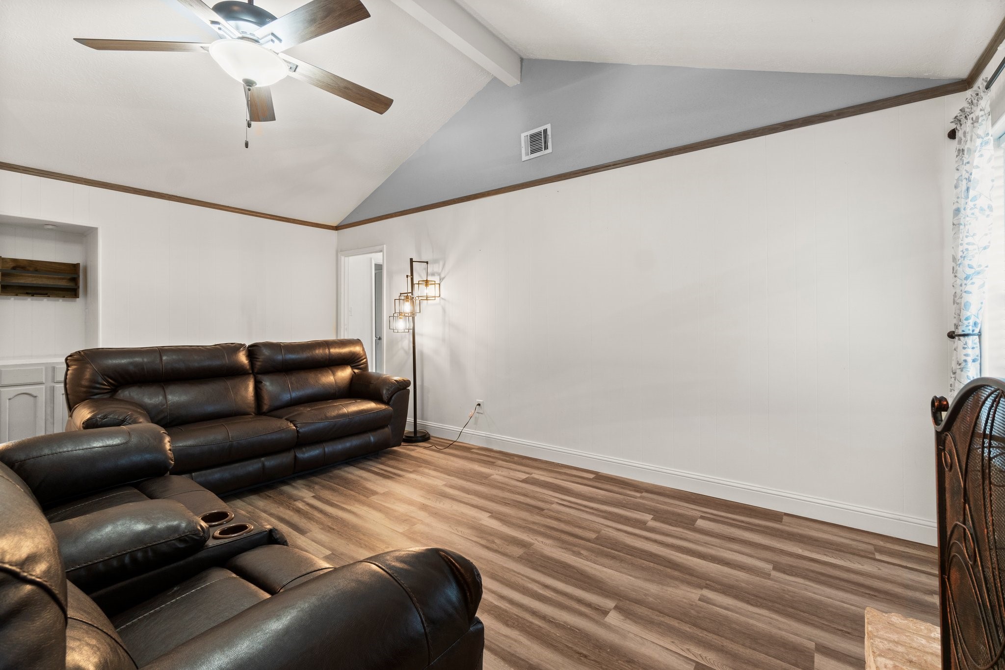 17610 Crestline Road Humble, TX 77396 - Photo 12 of 36 a living room with furniture and a ceiling fan