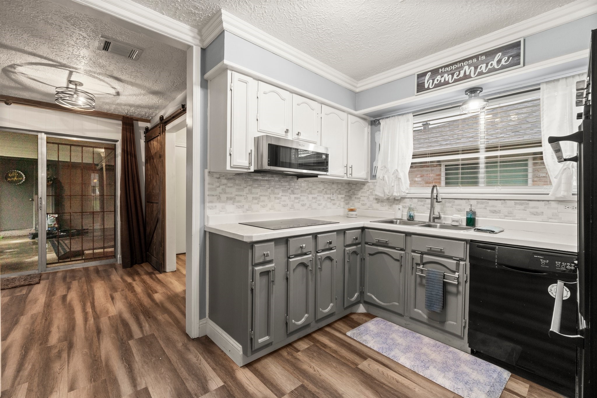 17610 Crestline Road Humble, TX 77396 - Photo 17 of 36 a kitchen with a sink stove and cabinets