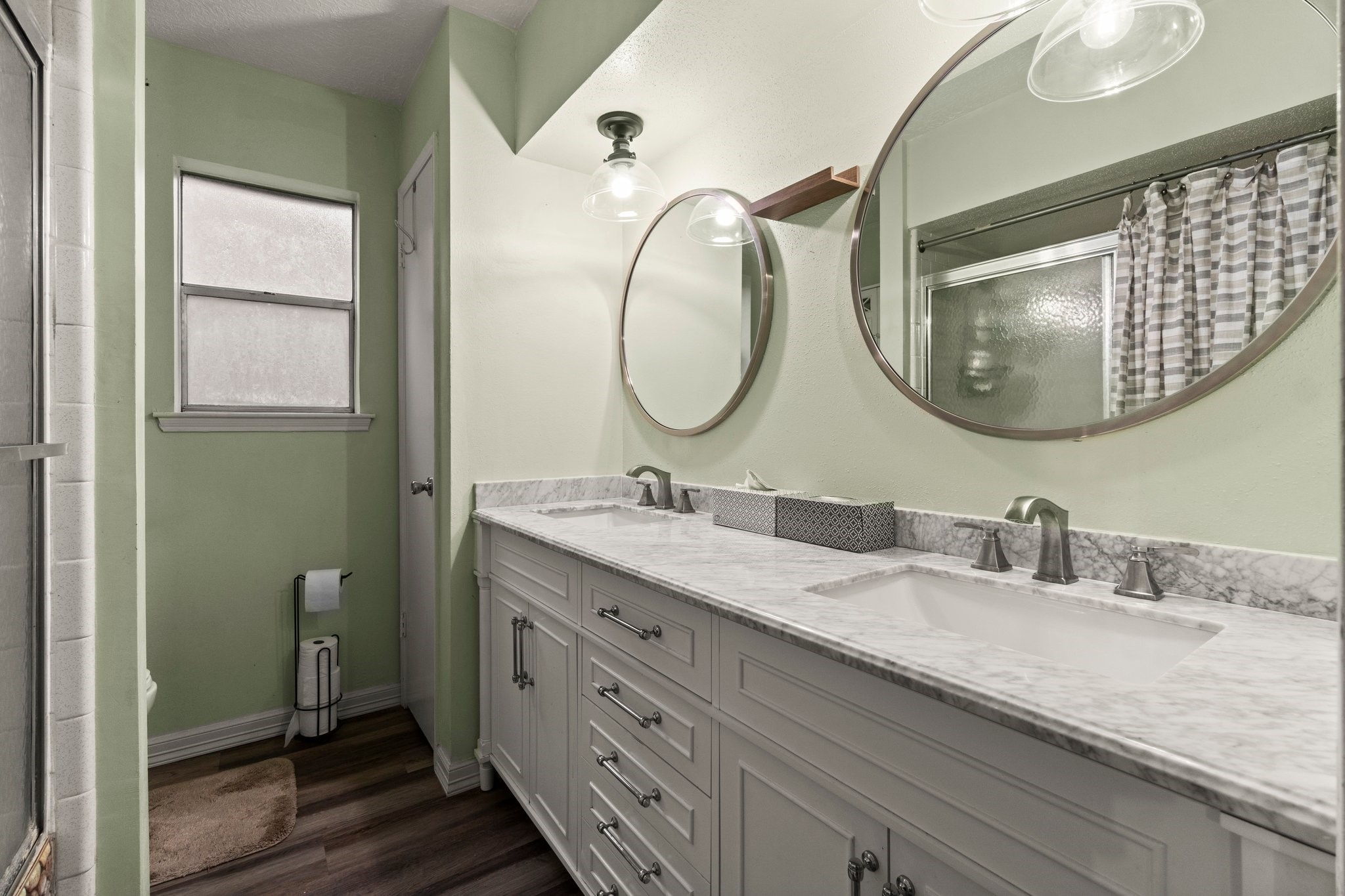 17610 Crestline Road Humble, TX 77396 - Photo 26 of 36 a bathroom with a granite countertop double vanity sink and a mirror