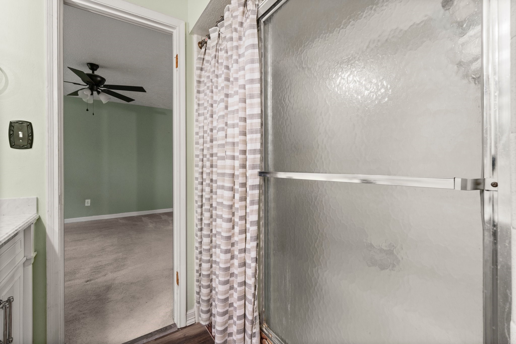 17610 Crestline Road Humble, TX 77396 - Photo 27 of 36 a bathroom with a shower and a sink