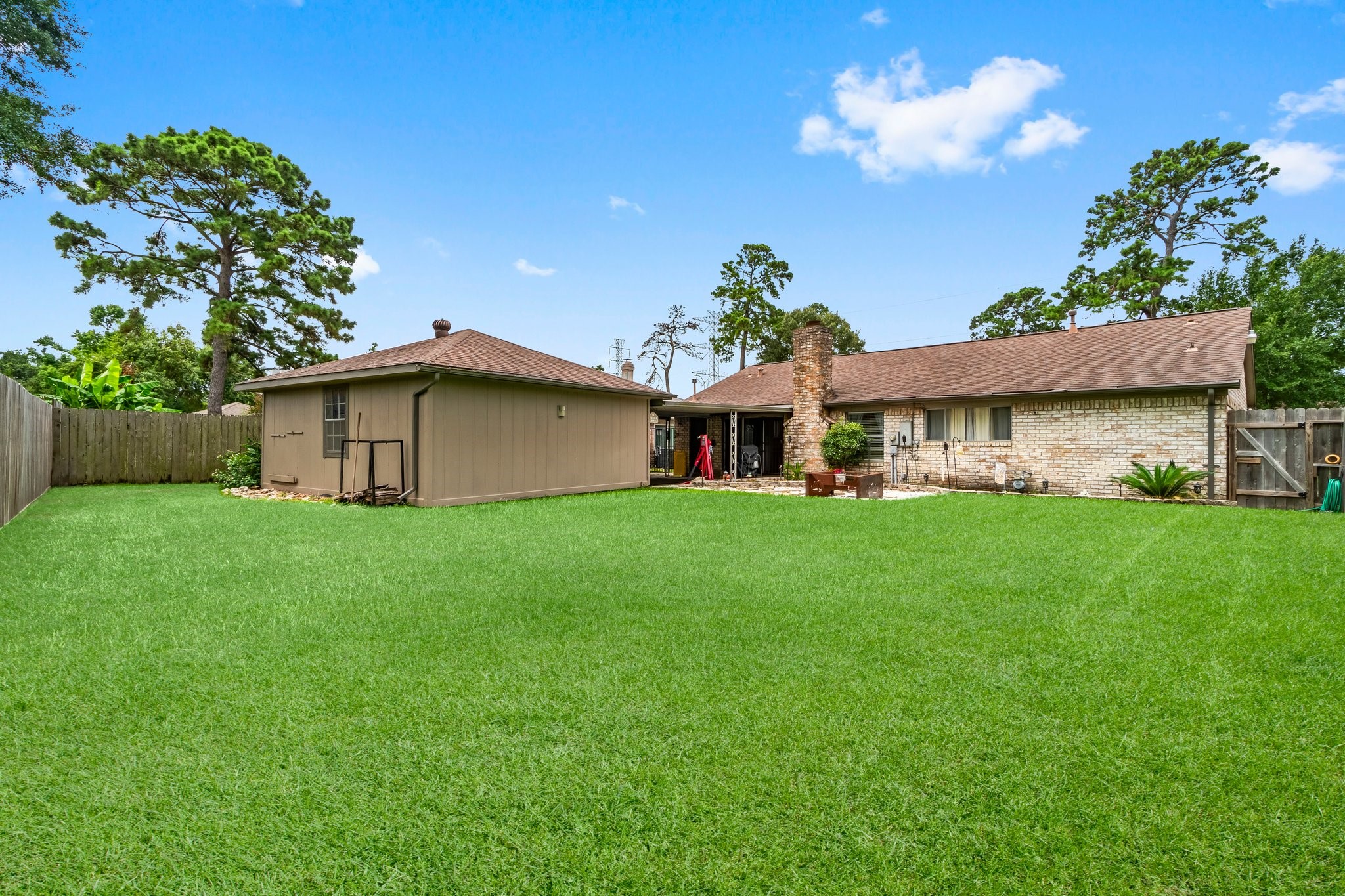 17610 Crestline Road Humble, TX 77396 - Photo 35 of 36 a view of an house with backyard space and balcony