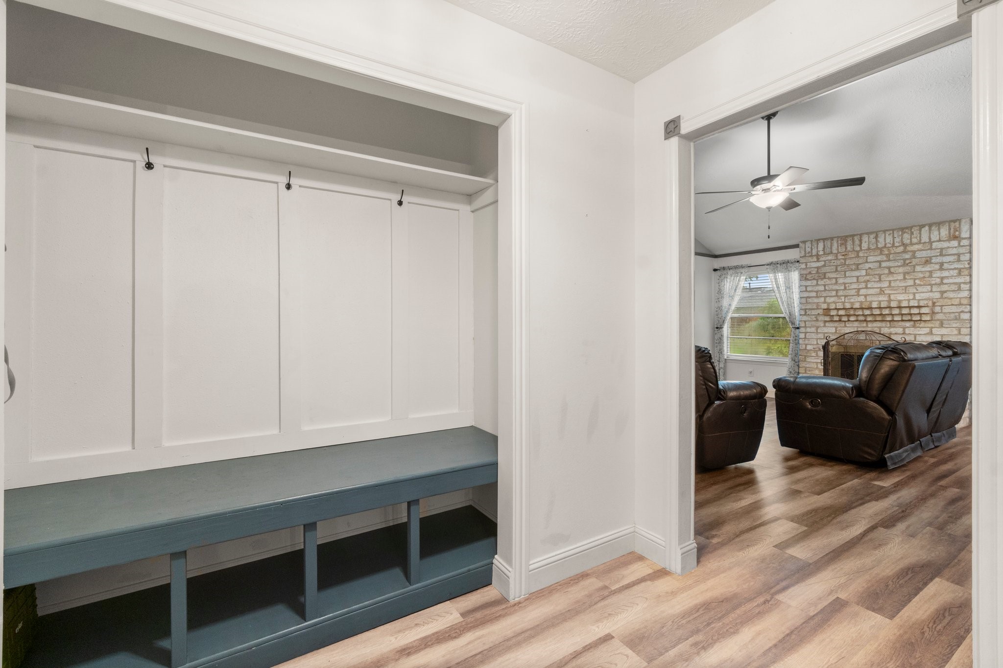 17610 Crestline Road Humble, TX 77396 - Photo 6 of 36 a living room with furniture and a fireplace