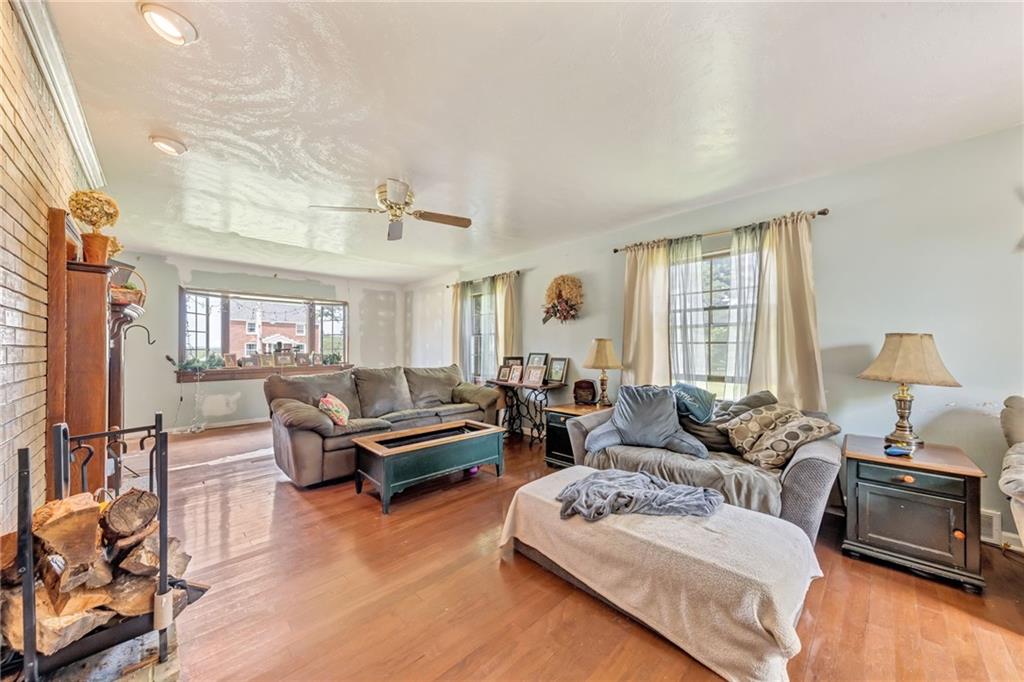 1017 McCoy Road McKees Rocks, PA 15136 - Photo 11 of 33 a living room with furniture and a window