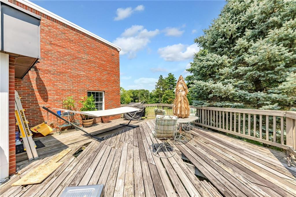 1017 McCoy Road McKees Rocks, PA 15136 - Photo 30 of 33 a view of balcony with chairs and wooden fence