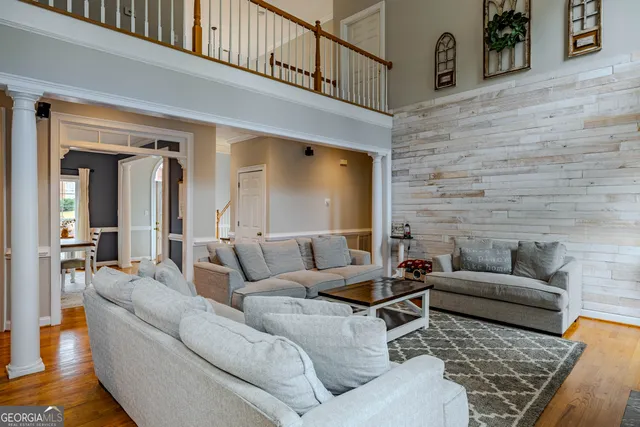 a bedroom with a bed dresser and a window