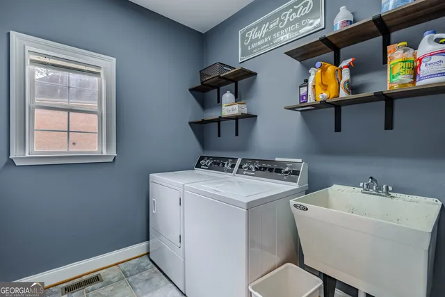 a room with a bed and a book shelf